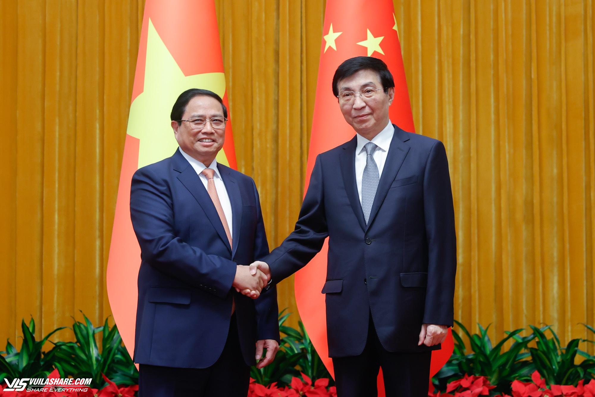 Thủ tướng Phạm Minh Chính hội kiến Chủ tịch Chính hiệp Trung Quốc Vương Hộ Ninh- Ảnh 1.