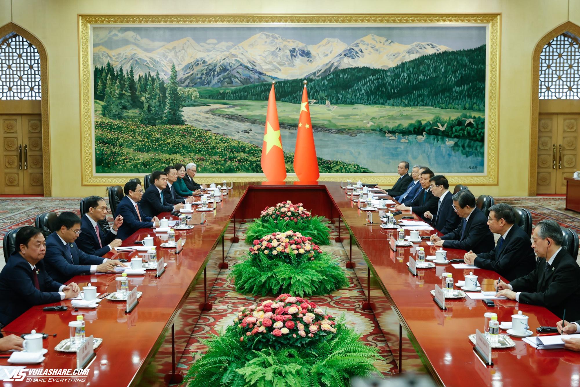 Thủ tướng Phạm Minh Chính hội kiến Chủ tịch Chính hiệp Trung Quốc Vương Hộ Ninh- Ảnh 2.
