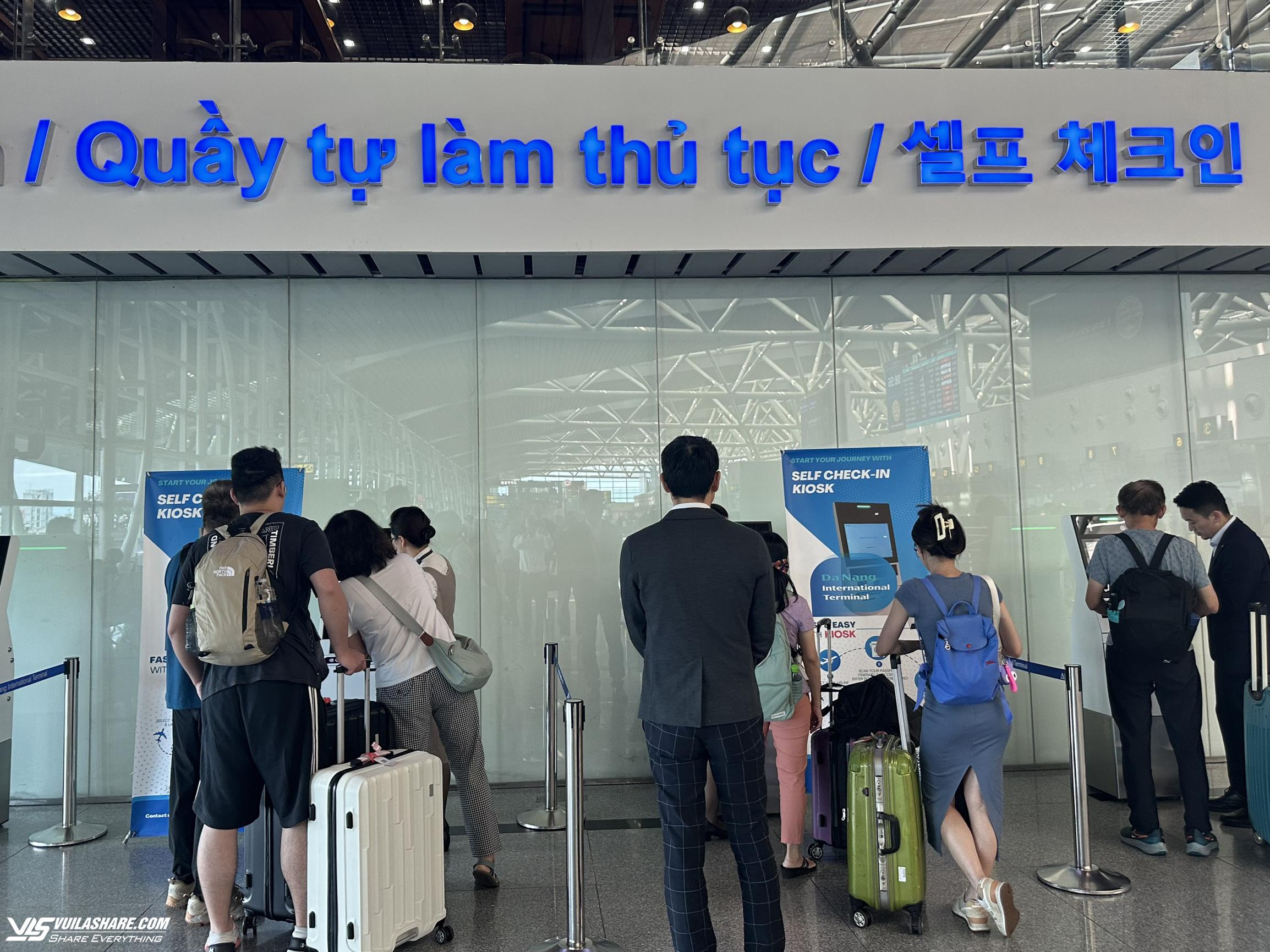 Nhà ga quốc tế Đà Nẵng hoàn thiện công nghệ làm thủ tục tự động- Ảnh 1.